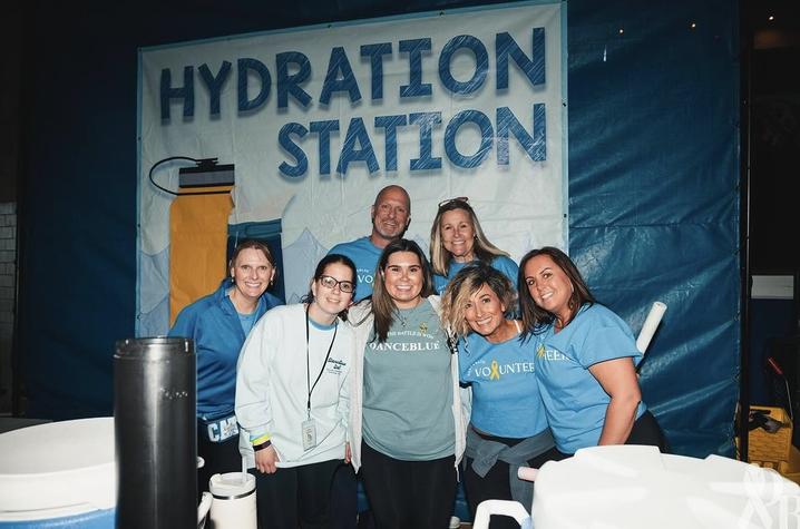 DanceBlue volunteers assist with tasks like manning the water stations so dancers have everything they need to stay on their feet all marathon long. Photo provided by DanceBlue. DanceBlue volunteers assist with tasks like manning the water stations so dancers have everything they need to stay on their feet all marathon long. Photo provided by DanceBlue.