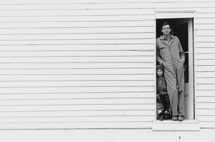 Wendell Berry and child in door - "Look and See" photo of Wendell Berry and child in door - "Look and See"